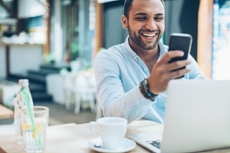 Man opening an account online using his smart phone